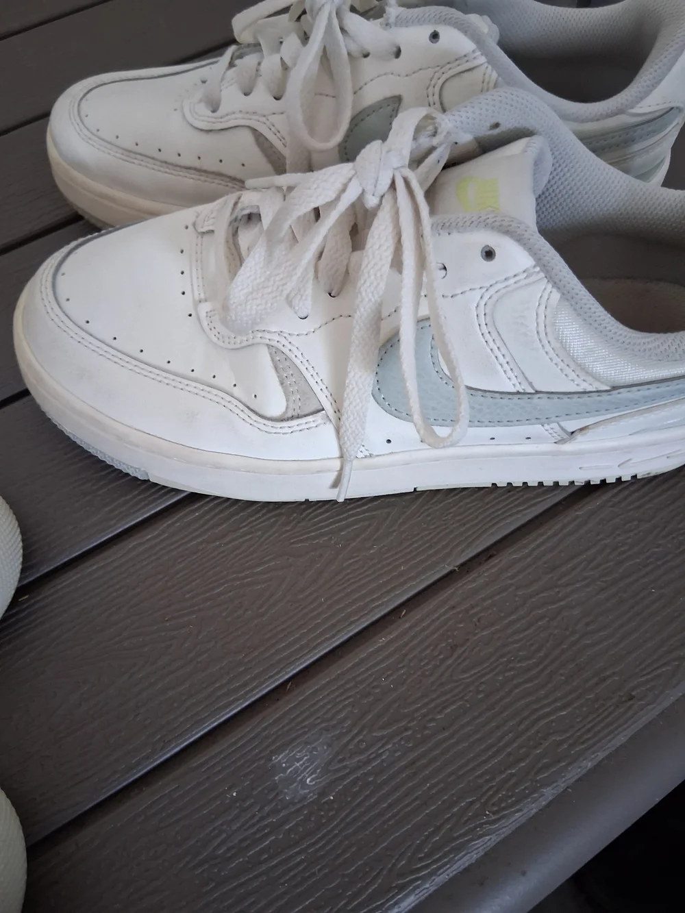 Nike White Low-Top Sneakers with Light Gray Swoosh